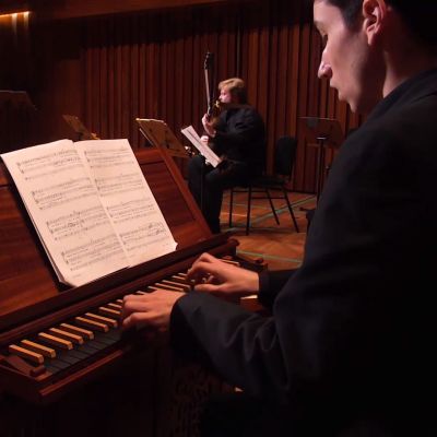 Harpsichord player peforms in Milton Court Concert Hall